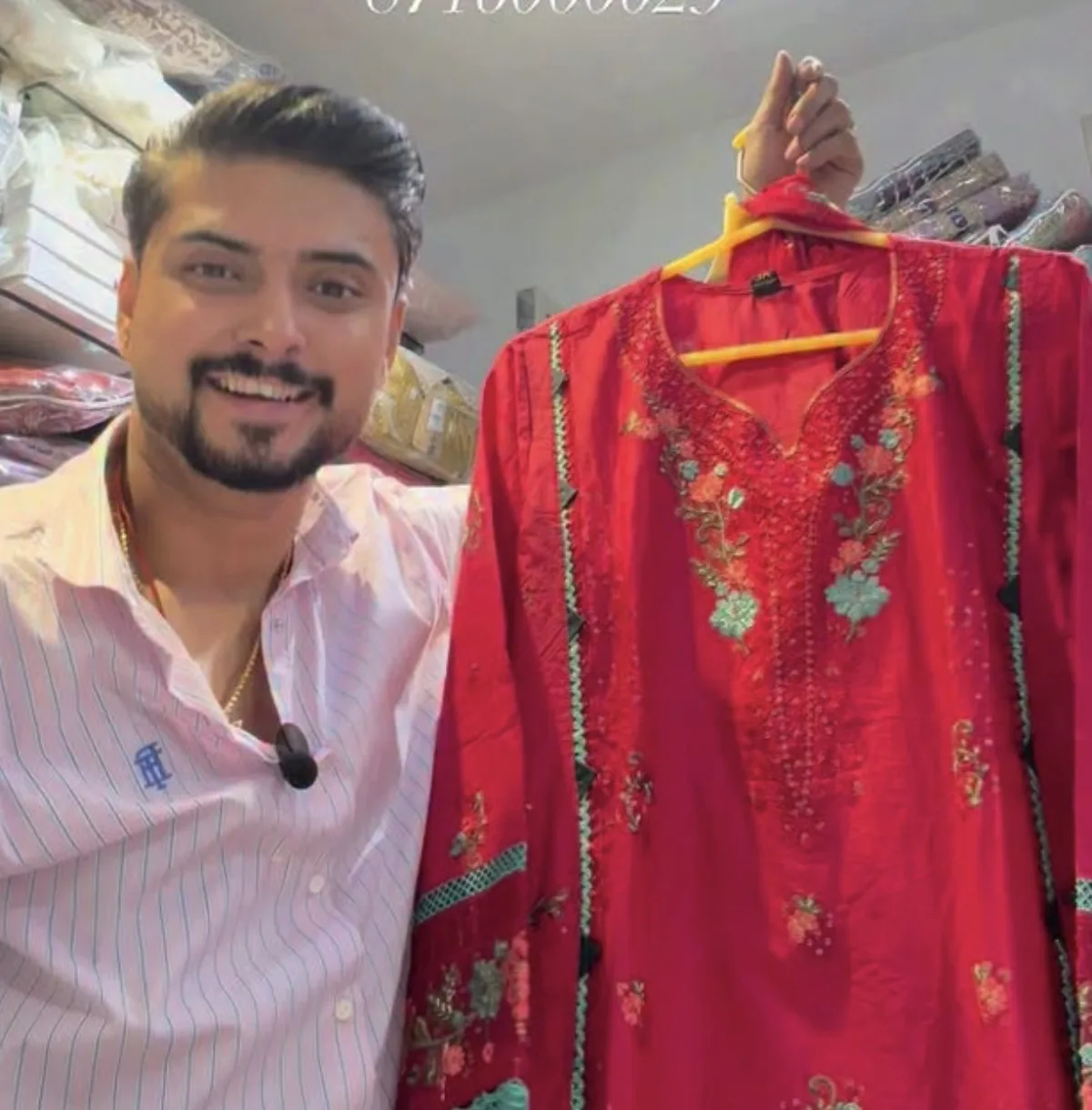 Crimson kurta with green and gold floral embroidery