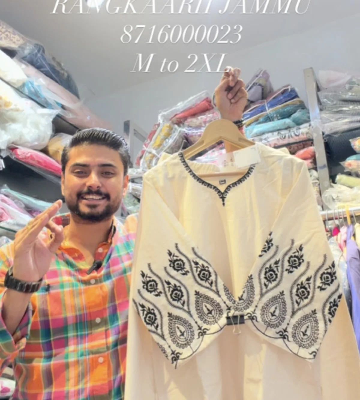 Ivory kurta with black rose embroidery across the yoke